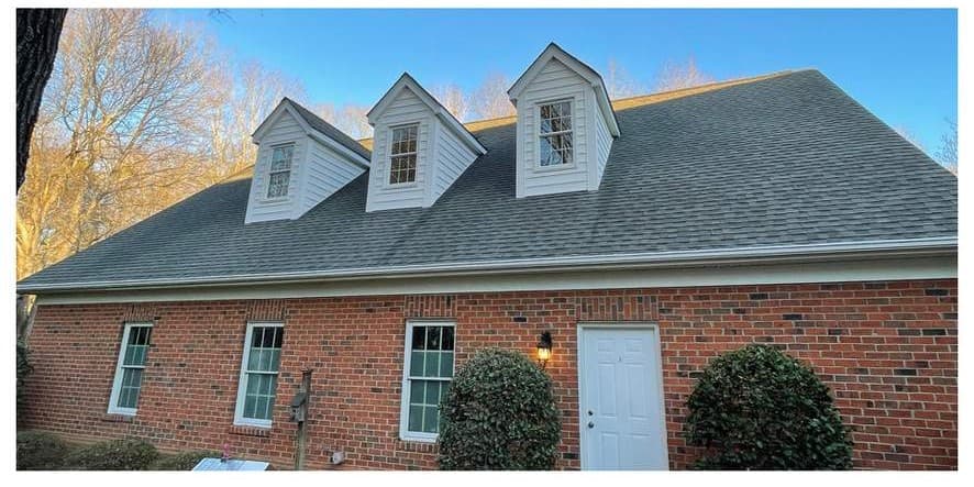 Clean asphalt shingle roof after soft-wash roof cleaning